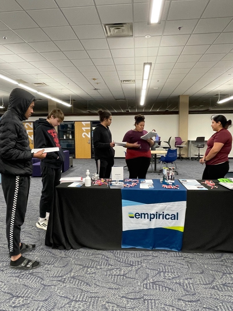 students talking to a rep